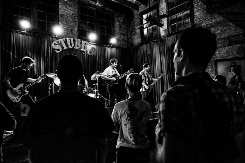 The crowd watching Otis The Destroyer at Stubb's in black and white