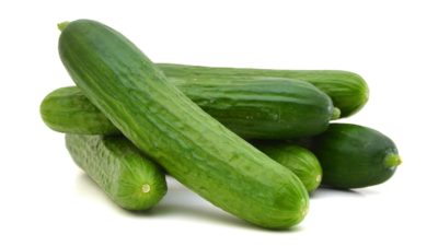 a stock image of five unmilked cucumbers