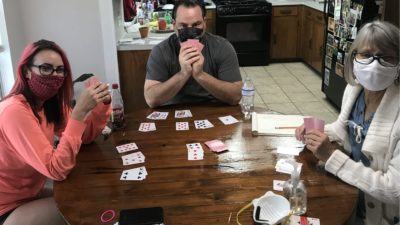 producer nick playing cards with his mom and sister on mother's day