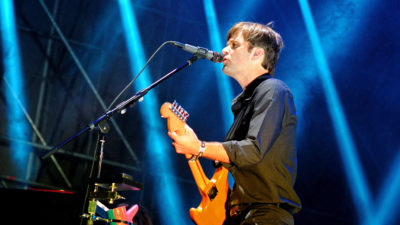 Ben Gibbard performing on stage
