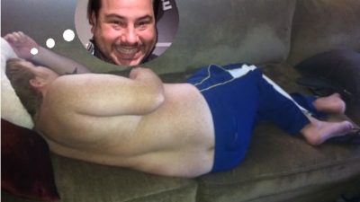 Jason sleeping on a couch with a thought bubble of Nick's face photoshopped in so he's dreaming of Nick