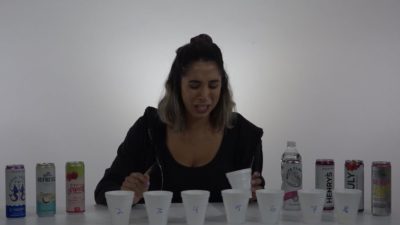 woman reacts to a bad drink