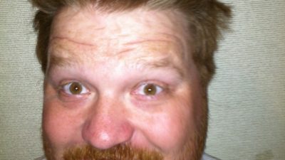 jason with a big grin on his face