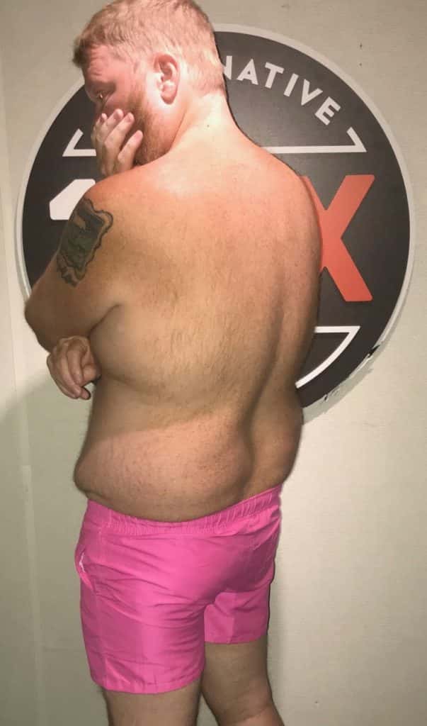 Jason wearing the super short pink swim trunks he recently bought