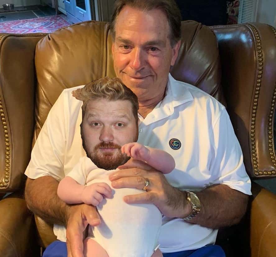 Jason's face photoshopped onto the body a baby being held by nick saban