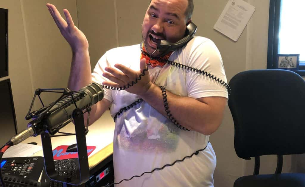 nick in studio with the phone cord wrapped around his torso