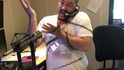 nick in studio with the phone cord wrapped around his torso