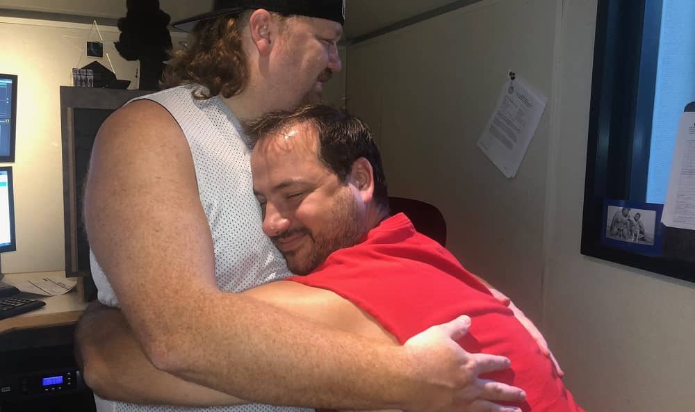 old picture of jason when he was fat hugging producer nick who still is fat