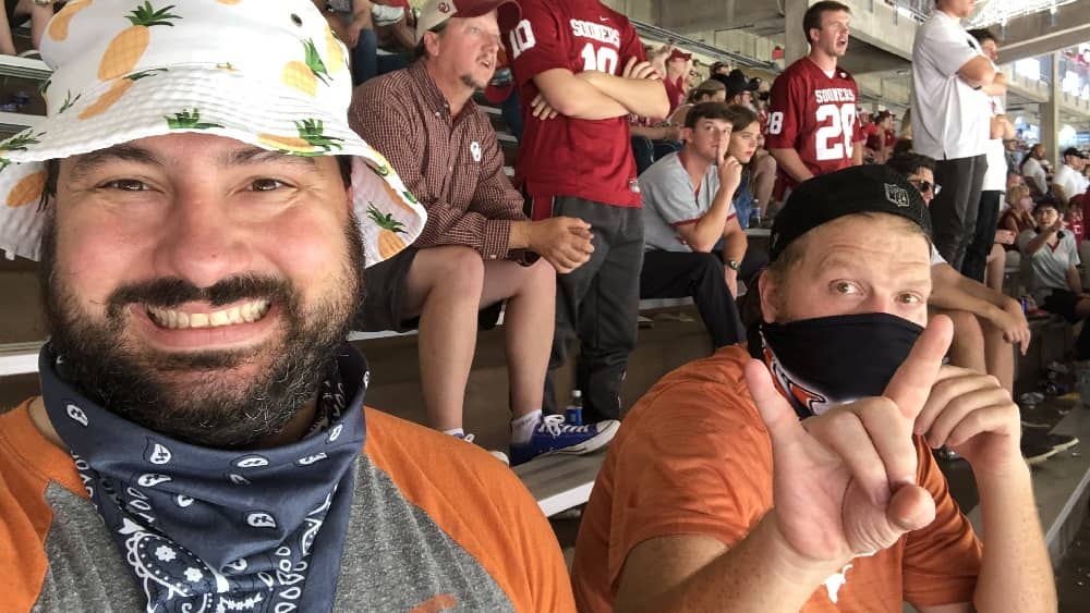 jason and nick sitting in the cotton bowl for texas ou