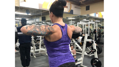 deb working out her back muscles in the gym