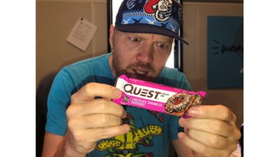 jason looking shocked at how many carbs are in his quest protein bars