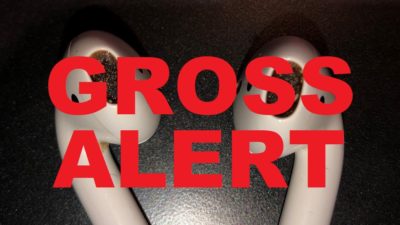 picture of jason's used airpods with gunk in the ear holes