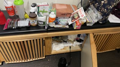 the mess in our studio cabinets from a rat