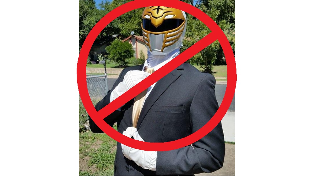 jason's roommate gil wearing a tuxedo and white power ranger mask