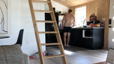 jason cooking in his underwear at Fredericksburg airbnb
