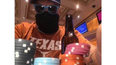 jason at the las vegas poker tables with a bud light and his chips