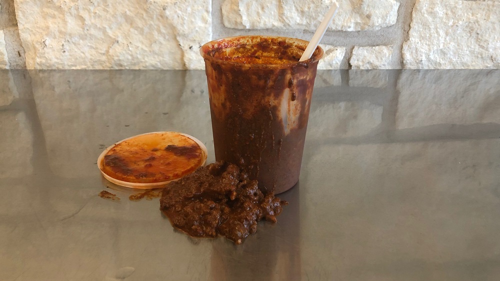two week old brisket chili from Franklins open on the kitchen counter