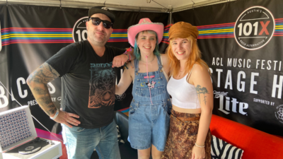CJ Morgan and Emily standing with Frances Forever at the 101X ACL tent