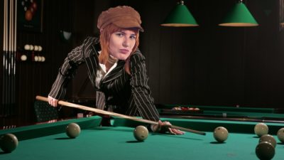 Emily's head photoshopped onto a stock photo of a woman shooting pool