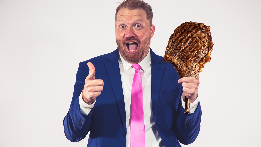 jason looking super excited with a tomahawk ribeye photoshopped into his hand