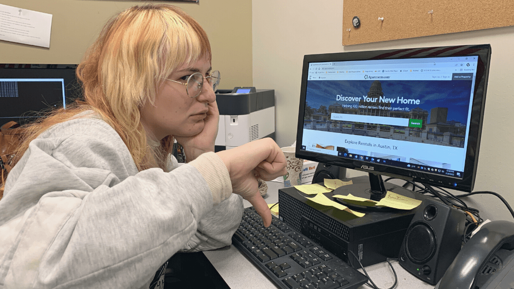 Emily giving a thumbs down to apartment hunting