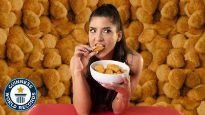 woman eating chicken nuggets