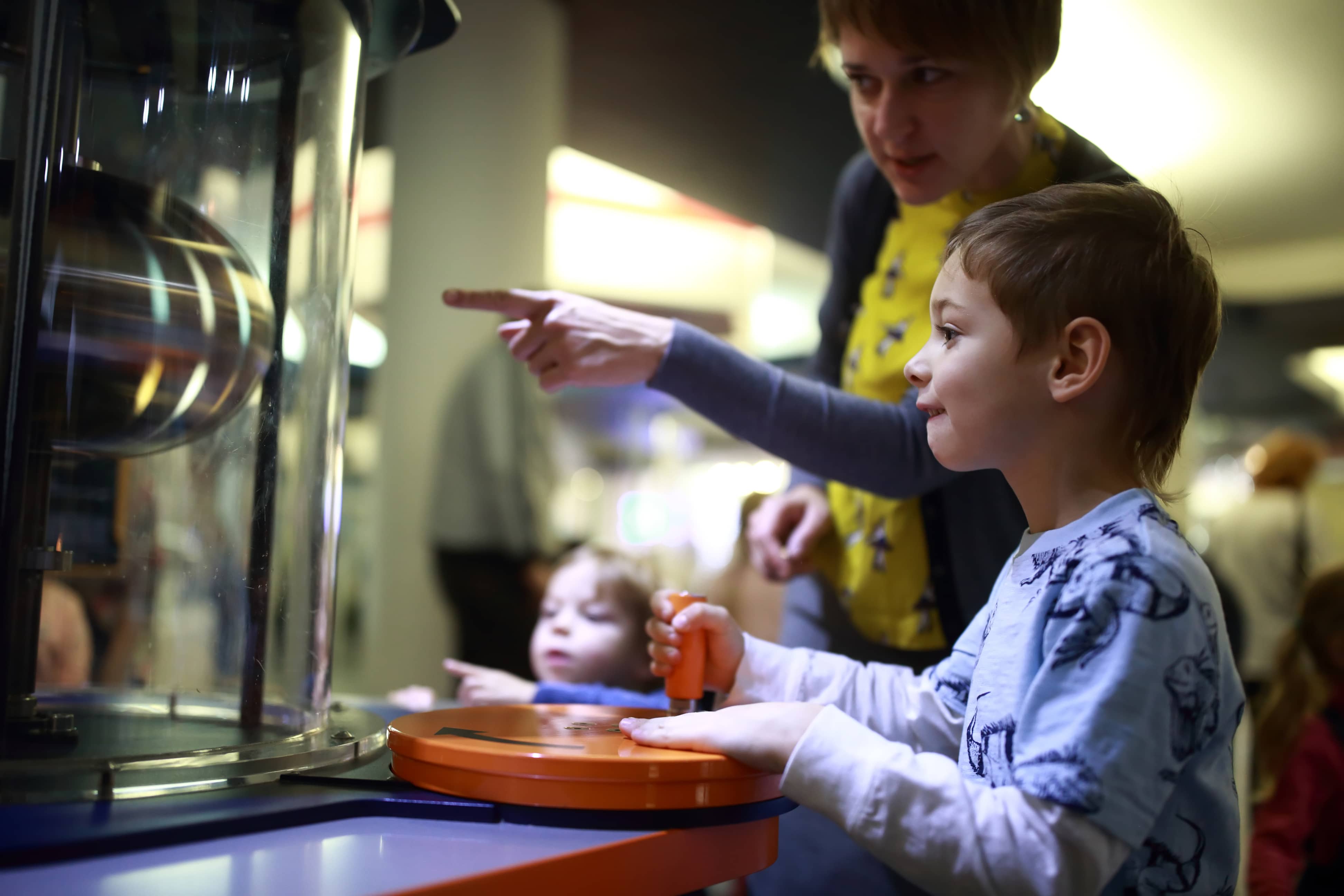 Family doing a physical experiment in laboratory