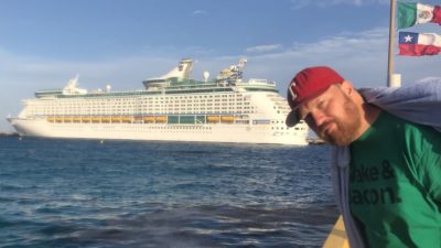 jason in front of a cruise ship