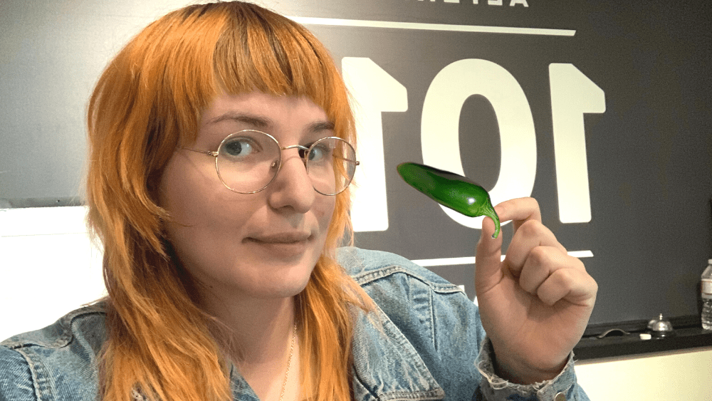 Emily holding a photoshopped jalapeno