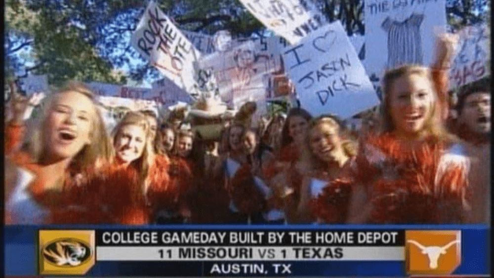 UT Game on TV with a I heart Jason Dick sign