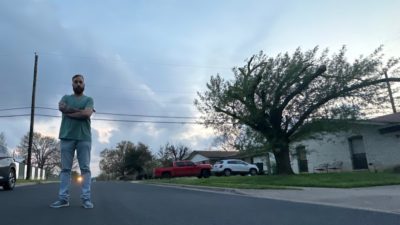cj morgan standing in a street