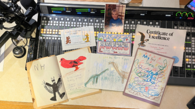 A collection of Nick's artwork and paper memories from his childhood that his mom kept