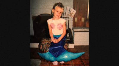 Young Emily in a costume of Ariel from The Little Mermaid.