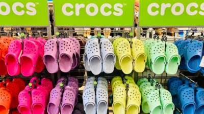 Crocs hanging on display in many colors. Image provided by Shutterstock
