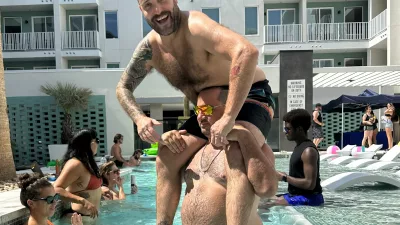nick and cj morgan playing chicken at the 101x pool party