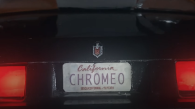 Screengrab from Music Video for Chromeo - Lost and Found, shows a car license pate with the tag reading "California - Chromeo"