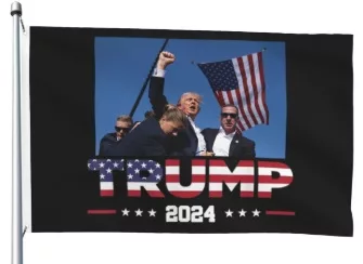 a flag with donald trump