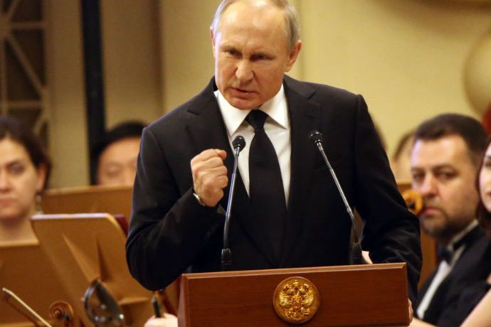 Vladimir Putin speaks to press associates in Saint Petersburg