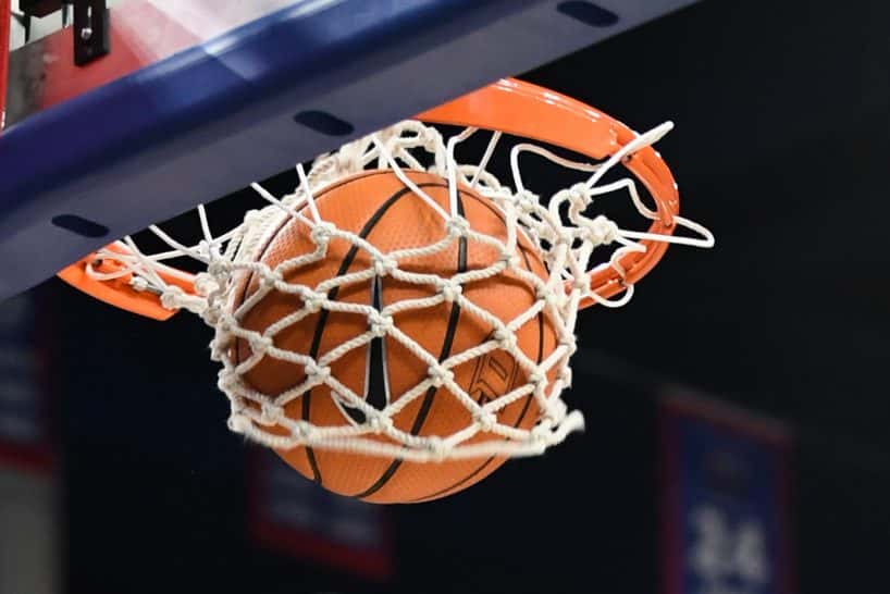 Photo of basketball going through a hoop - Photo from Getty Images and Icon Sportswire