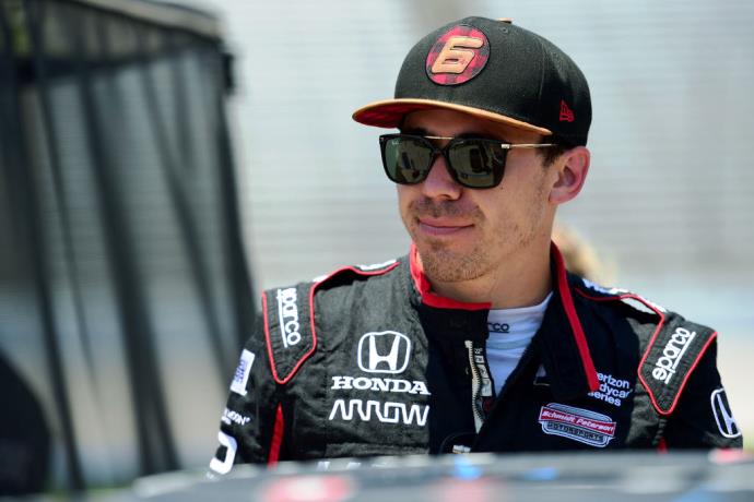 IndyCar driver Robert Wickens smiles at the racetrack. Photo by Jared C. Tilton/Getty.