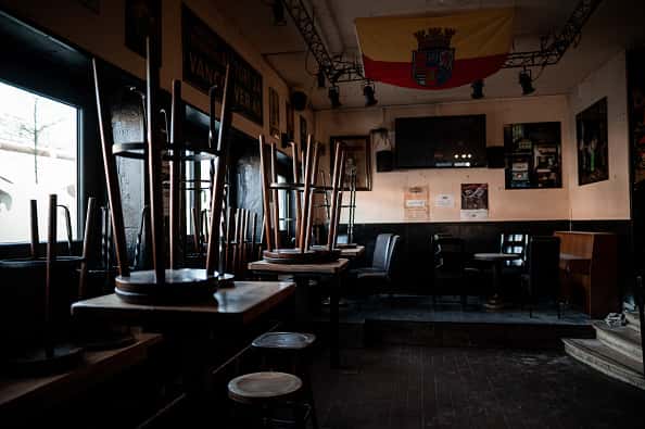 An empty restaurant with the chairs up