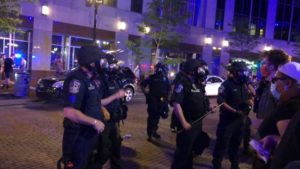 Cops and protesters in Indy