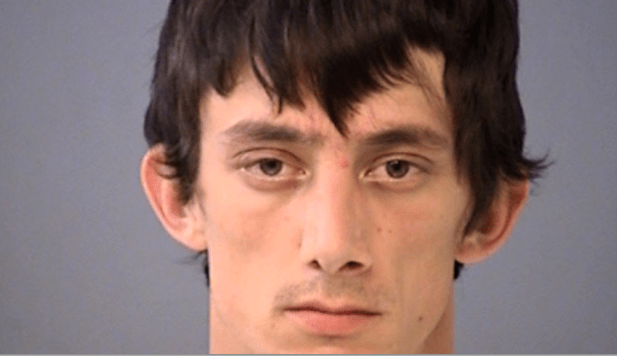 A mugshot of Tyler Newby.