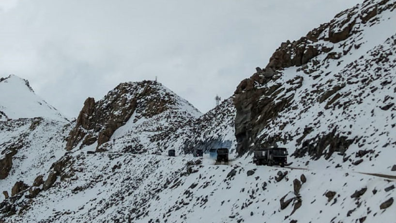 Troop trucks moving along China-India border