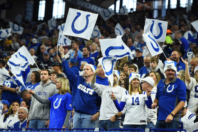 Fans of the Indianapolis Colts celebrate a touchdown against the Tennessee Titans during the first quarter at Lucas Oil Stadium on December 01, 2019 in Indianapolis, Indiana.