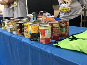 donated canned goods on table