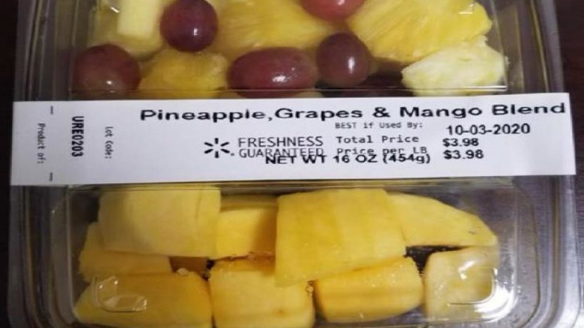 A package of fresh-cut pineapple, grapes, and mango
