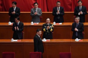 Chinese leaders clapping