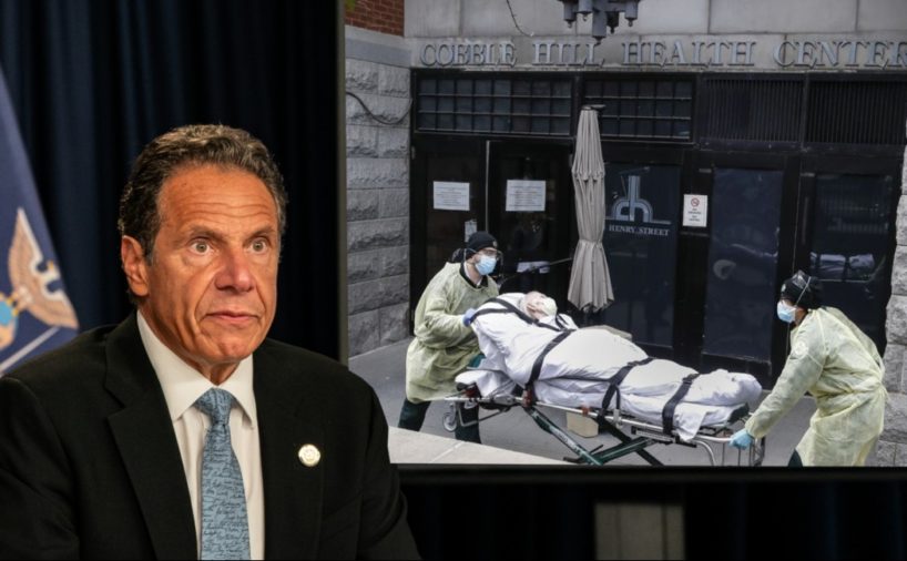 New York Gov. Andrew Cuomo sits in front of screen showing workers carrying dead person out of an elderly care facility.