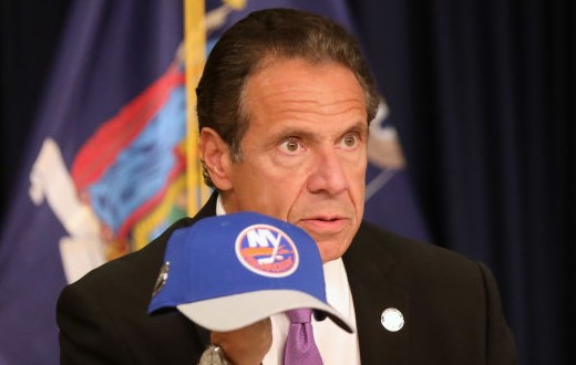 New York state Gov. Andrew Cuomo holds an NHL New York Islanders hat at a news conference on September 08, 2020 in New York City. Cuomo, though easing restrictions on casinos and malls throughout the state, has declined to do so for indoor dining in restaurants in New York City despite pressure from business owners, citing struggles by the city to enforce the state's previous orders. (Photo by Spencer Platt/Getty Images)